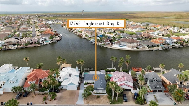 13765 Eaglesnest Bay Dr, Corpus Christi, TX 78418 - aerial view of residential area featuring a large body of water