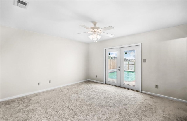 13765 Eaglesnest Bay Dr, Corpus Christi, TX 78418 - carpeted empty room with french doors and ceiling fan