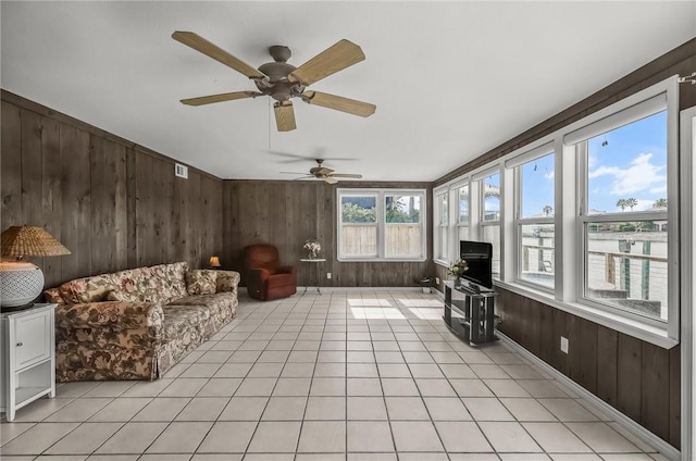 13765 Eaglesnest Bay Dr, Corpus Christi, TX 78418 - sunroom / solarium featuring wood walls and tile patterned floors