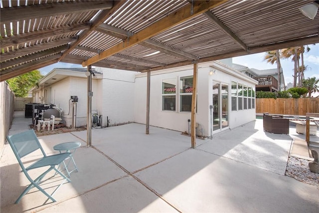 13765 Eaglesnest Bay Dr, Corpus Christi, TX 78418 - fenced backyard featuring a pergola and a patio area