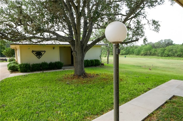 exterior space with a front yard