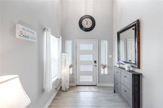 15417 Palmira Ave Unit B, Corpus Christi, TX 78418 - entrance foyer featuring a high ceiling and baseboards
