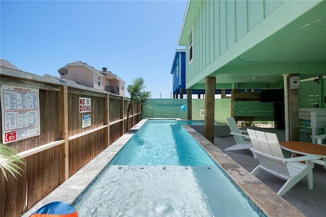 268 Flounder Dr, Port Aransas, TX 78373 - view of swimming pool with a patio area