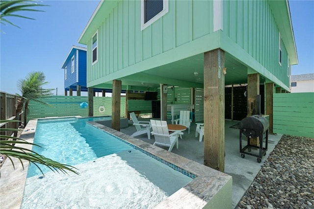 268 Flounder Dr, Port Aransas, TX 78373 - view of pool with a patio area, a fenced backyard, and a grill