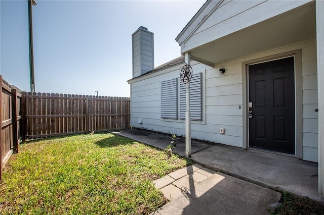 view of yard featuring a fenced backyard and a patio