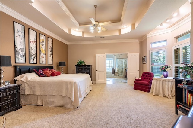 bedroom featuring crown molding, light colored carpet, a raised ceiling, and ceiling fan