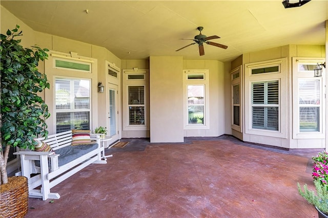 view of patio with ceiling fan