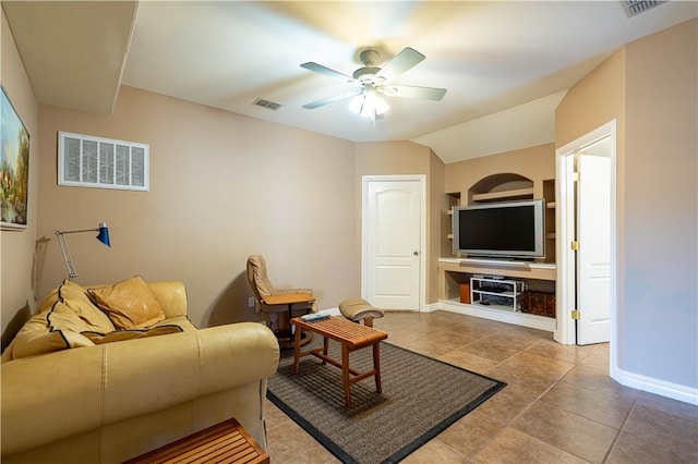 tiled living room featuring vaulted ceiling and ceiling fan