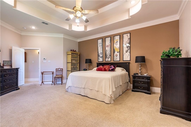 bedroom with light carpet, crown molding, a raised ceiling, and ceiling fan