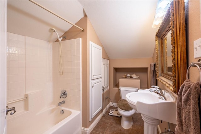 bathroom featuring lofted ceiling,  shower combination, tile patterned floors, and toilet