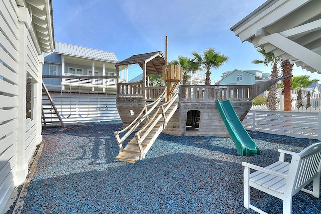 view of jungle gym with fence