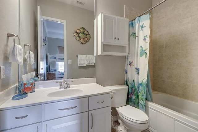 ensuite bathroom with visible vents, toilet, shower / bath combo, ensuite bath, and vanity