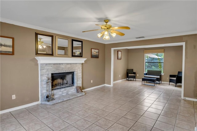 2826 Toronto Dr, Corpus Christi, TX 78414 - living room featuring a ceiling fan, crown molding, a fireplace, light tile patterned flooring, and baseboards