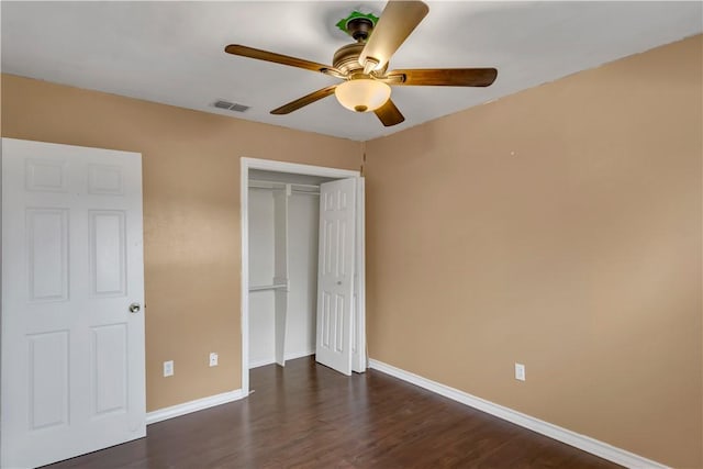 2826 Toronto Dr, Corpus Christi, TX 78414 - unfurnished bedroom with baseboards, a closet, dark wood-type flooring, and ceiling fan