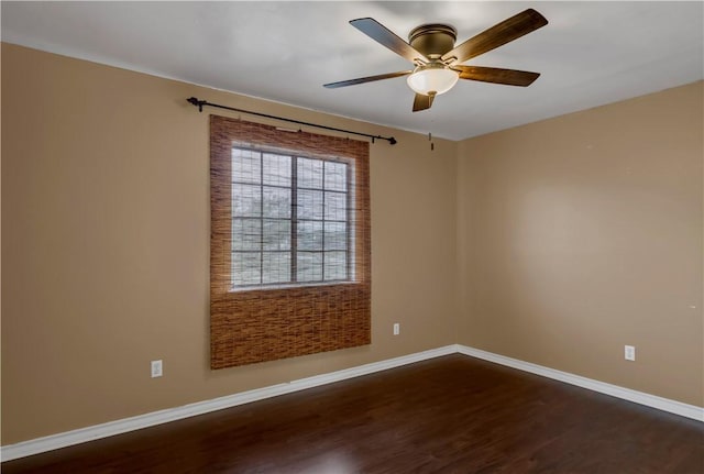 2826 Toronto Dr, Corpus Christi, TX 78414 - unfurnished room featuring dark wood-style floors, baseboards, and ceiling fan