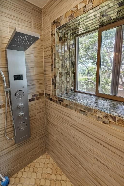 266 Lola Johnson Rd, Corpus Christi, TX 78418 - full bath with a tile shower and tile walls