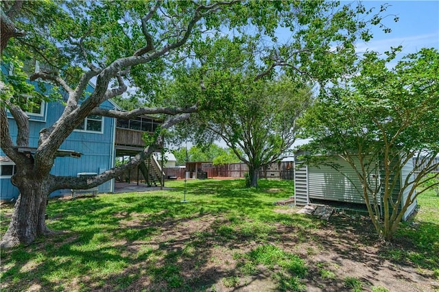 266 Lola Johnson Rd, Corpus Christi, TX 78418 - view of yard featuring stairs and an outdoor structure