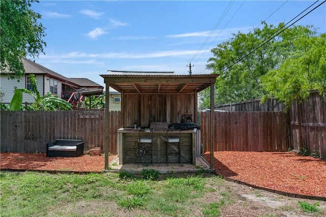 266 Lola Johnson Rd, Corpus Christi, TX 78418 - view of outdoor structure with a fenced backyard