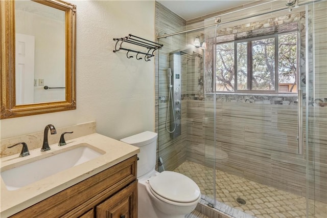 266 Lola Johnson Rd, Corpus Christi, TX 78418 - full bath featuring toilet, a stall shower, and vanity