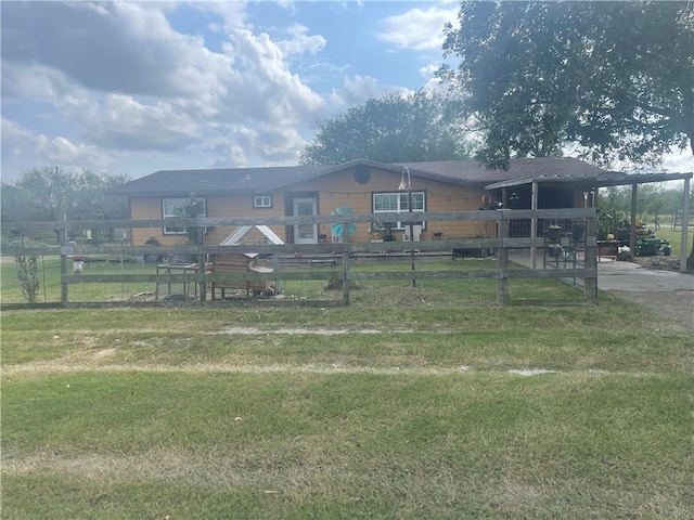 view of community featuring a patio area and a yard