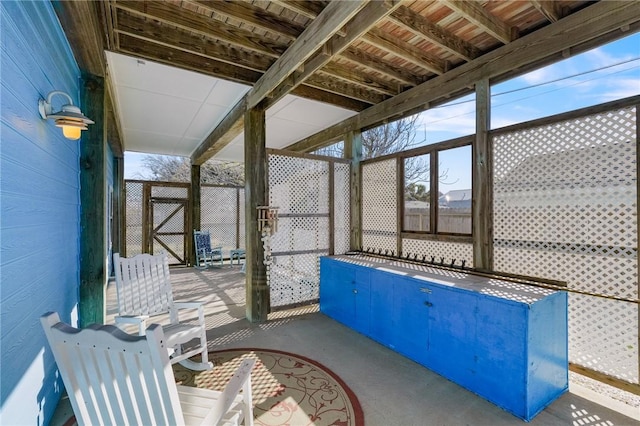 1035 Sea Secret St, Port Aransas, TX 78373 - sunroom / solarium featuring beam ceiling and a wealth of natural light