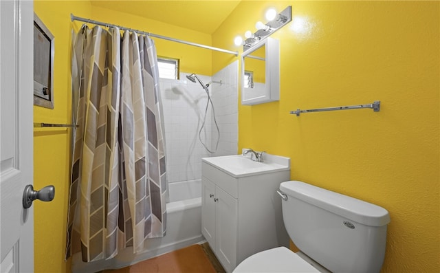 full bathroom featuring vanity, toilet, and shower / bathtub combination with curtain