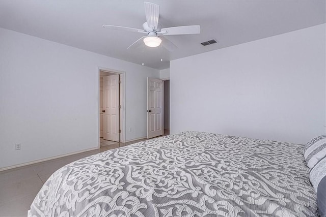 bedroom with tile patterned floors, baseboards, a ceiling fan, and visible vents