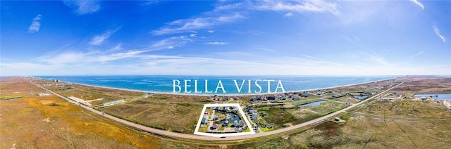 bird's eye view featuring a water view and a beach view