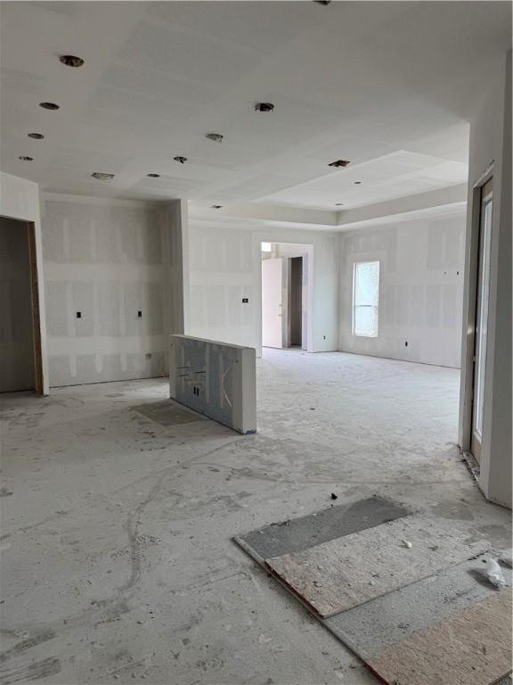 empty room featuring a tray ceiling