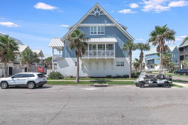 view of front of home with a standing seam roof and metal roof