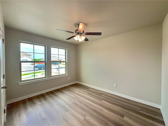 3405 Tanzanite Dr, Corpus Christi, TX 78414 - spare room with wood finished floors and ceiling fan