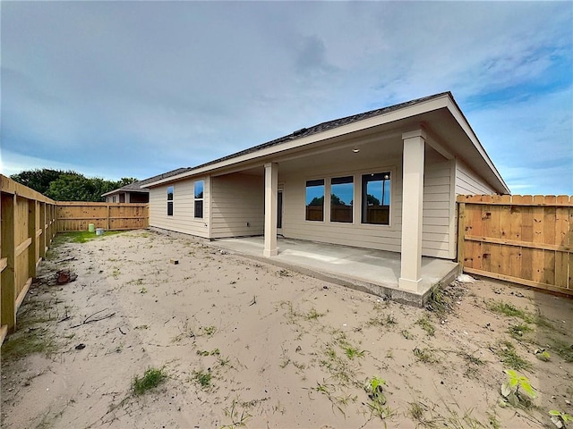 3405 Tanzanite Dr, Corpus Christi, TX 78414 - back of house with a patio area and a fenced backyard