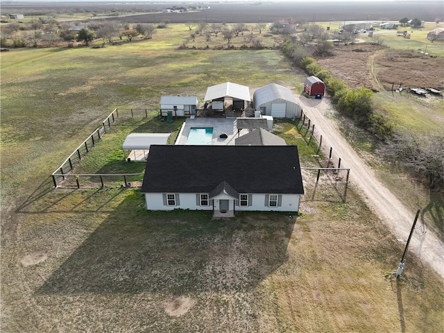 birds eye view of property featuring a rural view