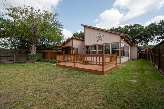 2725 Persimmon St, Corpus Christi, TX 78415 - rear view of property with a deck and a sunroom