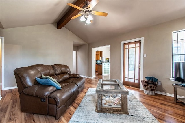 2725 Persimmon St, Corpus Christi, TX 78415 - living room featuring a ceiling fan, baseboards, and wood finished floors