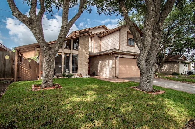2725 Persimmon St, Corpus Christi, TX 78415 - mid-century home featuring driveway, brick siding, and an attached garage