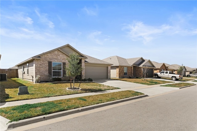 single story home featuring central air condition unit, a garage, and a front lawn