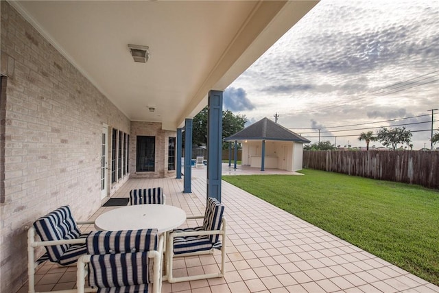6714 Long Meadow Dr, Corpus Christi, TX 78413 - fenced backyard with a patio and outdoor dining space