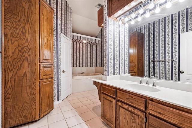 6714 Long Meadow Dr, Corpus Christi, TX 78413 - full bath with wallpapered walls, a garden tub, tile patterned floors, and vanity