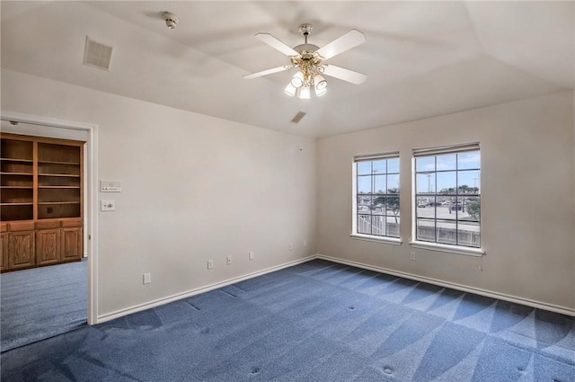 6714 Long Meadow Dr, Corpus Christi, TX 78413 - empty room with dark carpet, ceiling fan, and a smoke detector