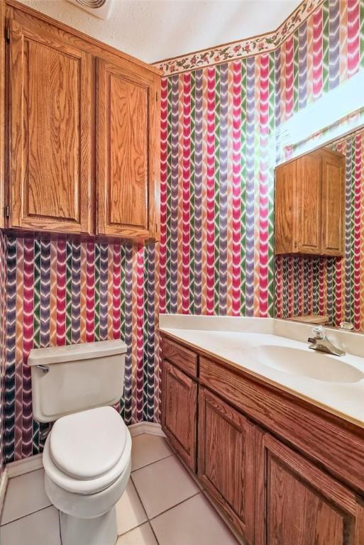 6714 Long Meadow Dr, Corpus Christi, TX 78413 - bathroom with vanity and tile patterned floors