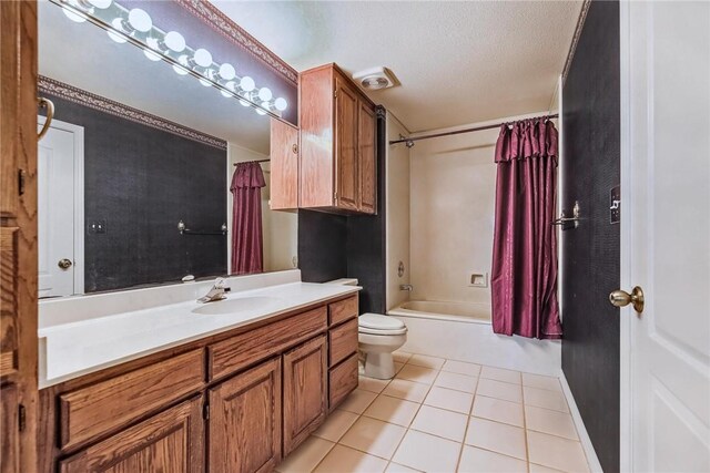 6714 Long Meadow Dr, Corpus Christi, TX 78413 - full bathroom featuring vanity, tile patterned floors, shower / tub combo, and a textured ceiling