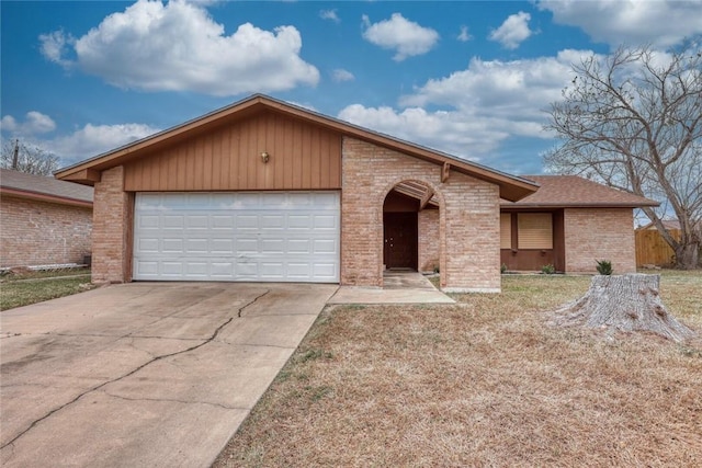 single story home featuring a garage