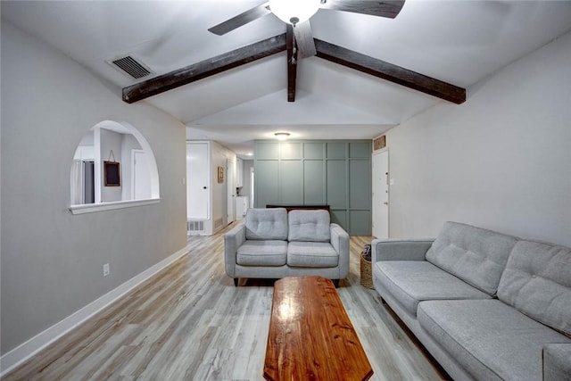 living room featuring vaulted ceiling with beams, ceiling fan, and light hardwood / wood-style floors