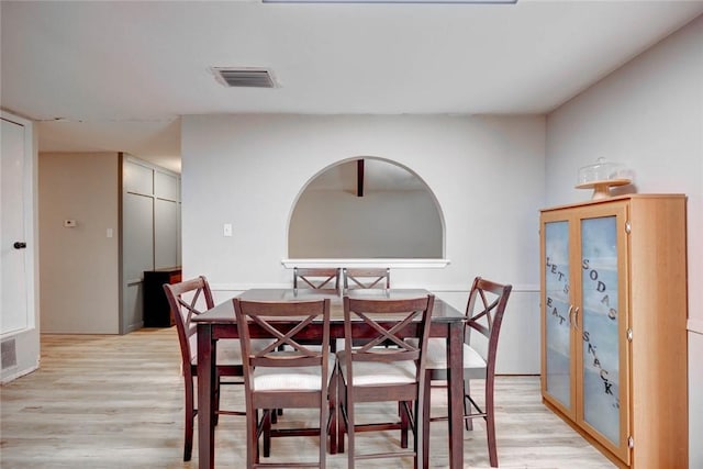 dining room with light hardwood / wood-style flooring