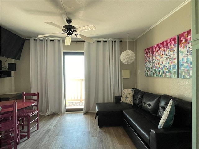 3938 Surfside Blvd Unit 1203, Corpus Christi, TX 78402 - living area with wood finished floors and ceiling fan