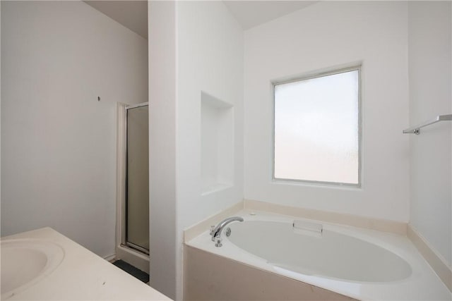 2626 Wool Dr, Corpus Christi, TX 78414 - full bathroom featuring a garden tub, a stall shower, and vanity
