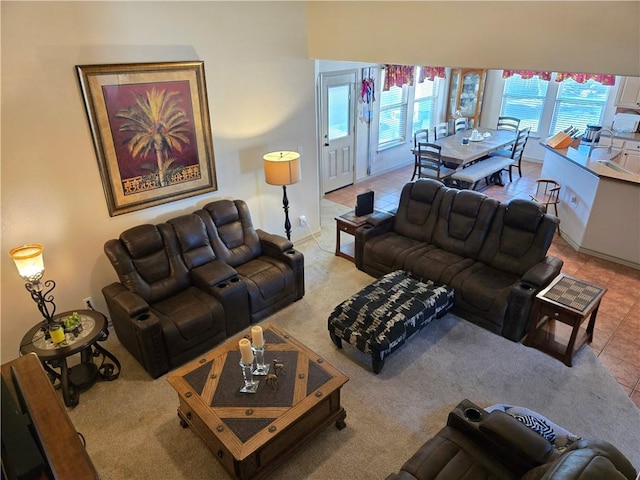 tiled living room featuring plenty of natural light