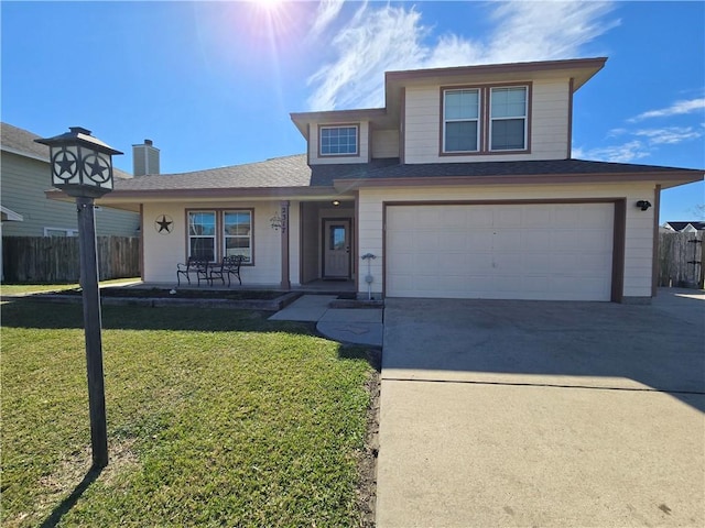 view of front of house with a front lawn and a garage