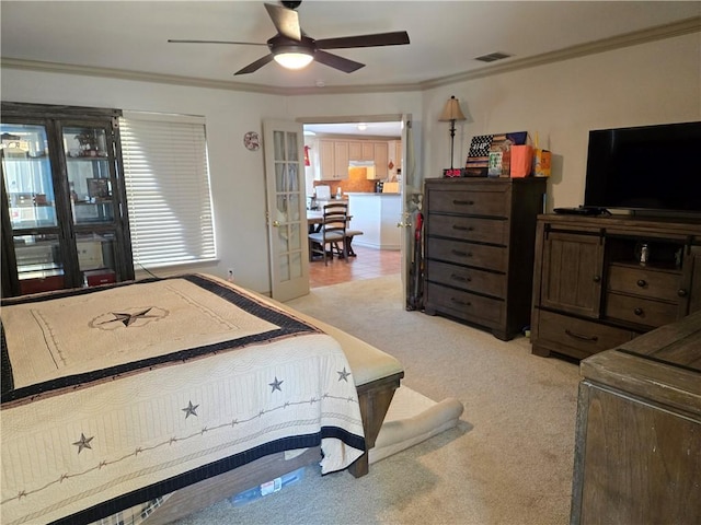 bedroom featuring ceiling fan, light colored carpet, and ornamental molding